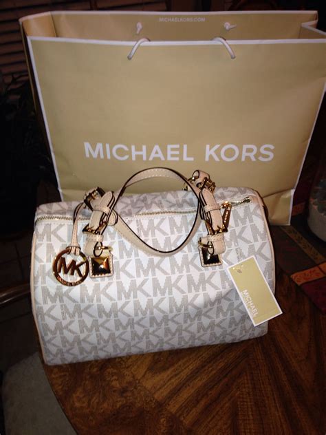 the real real michael kors handbags